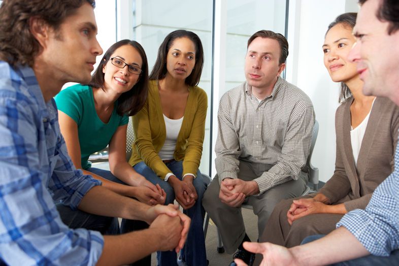 Friends sharing together in a Father Encounters Group