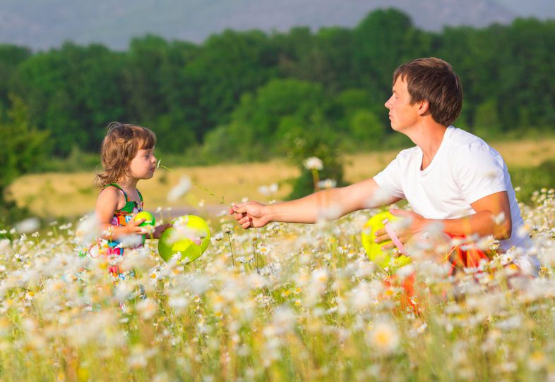 Time with the Father (God) - little girl with her father in a meadow